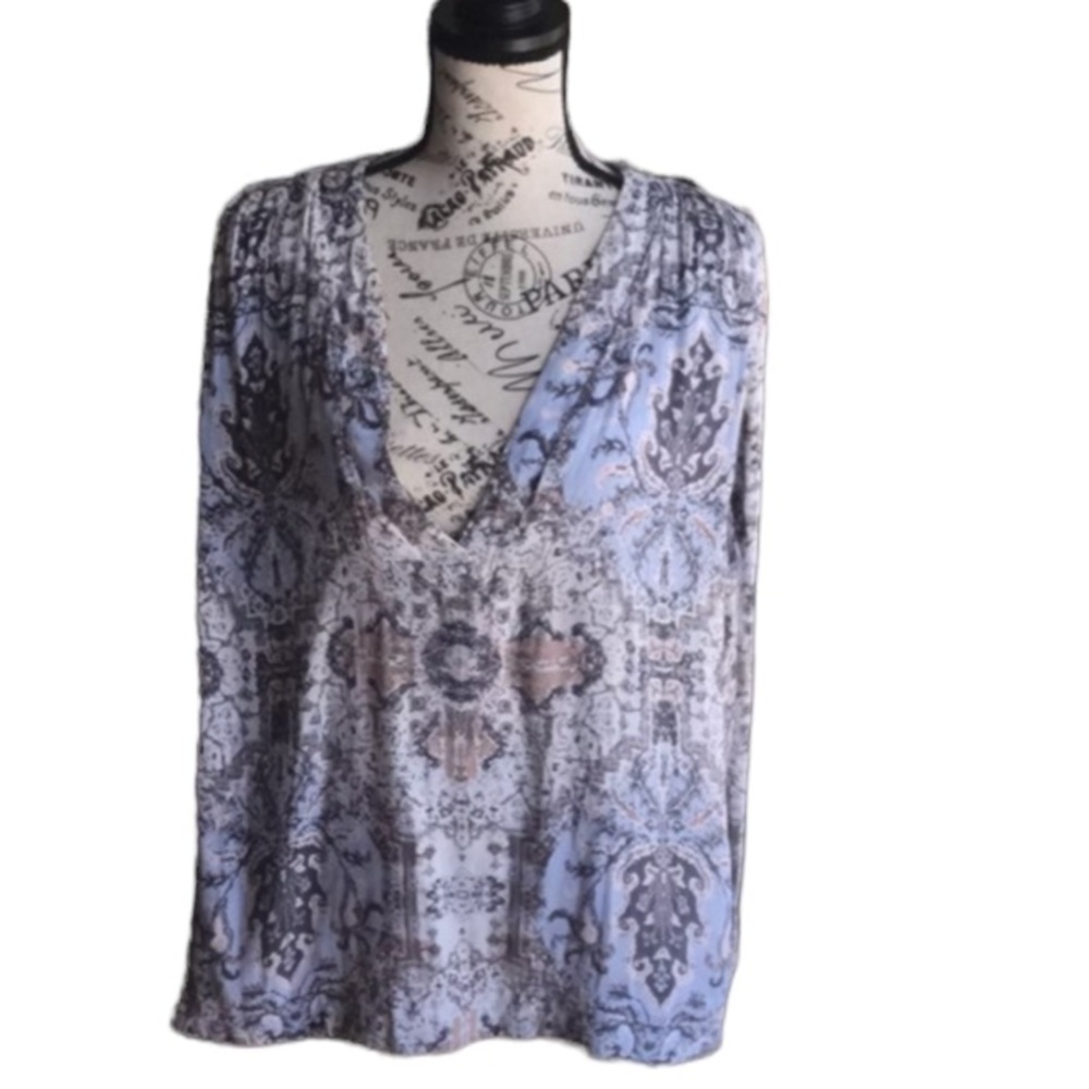 Free People sleeveless blue mites top. Size large GUC